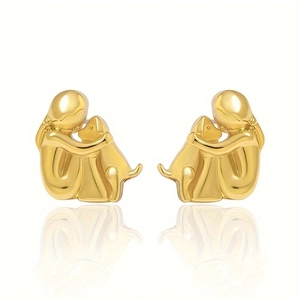Polished gold stud earrings featuring a minimalist girl hugging dog silhouette design