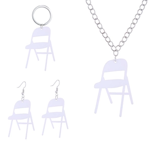Detail of white acrylic mini folding chair jewelry set with necklace and earrings