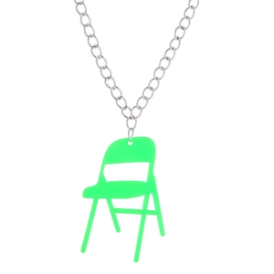 Detail of neon green acrylic chair pendant on a silver metal chain necklace