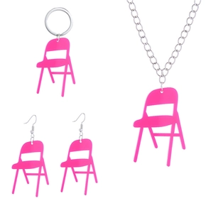 Pink acrylic mini folding chair jewelry set featuring matching earrings and necklace