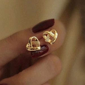Exquisite gold-plated heart-shaped stud earrings with sparkling zircon stones
