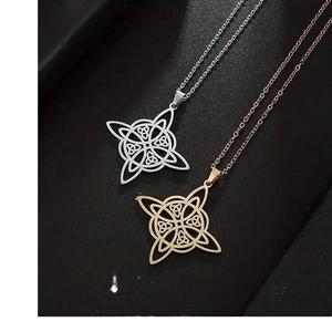 Double-layered Celtic knot pendant necklace set in gold and silver stainless steel finish