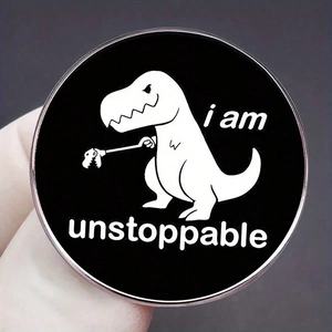 Spilla in smalto nero a forma di dinosauro con T-Rex bianco e testo I Am Unstoppable