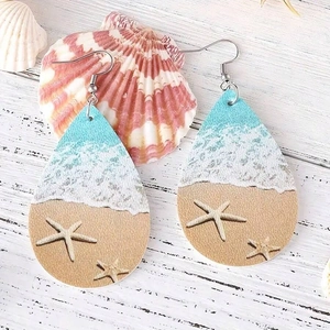 Ocean wave pattern teardrop leather earrings with starfish and beach theme prints
