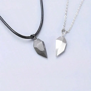 Minimalist heart-shaped magnetic couple necklaces with matte grey and silver pendants