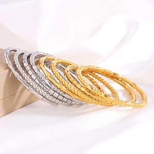 Ensemble de bracelets en acier inoxydable doré et argenté aux textures de bambou