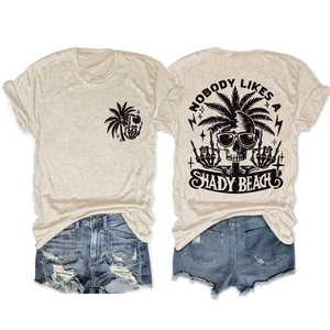 Front and back detail of graphic t-shirt with palm tree logo and skull beach print