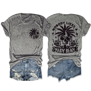 Front and back detail of gray T-shirt with palm trees and skull graphic prints