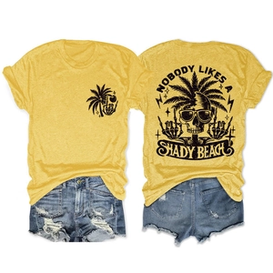 Front and back view of mustard yellow T-shirt with vintage skull print and denim shorts