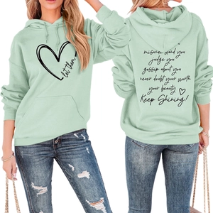 Detailed front and back view of a mint green hoodie with heart and inspirational text