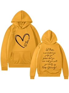 Detail view of mustard yellow hoodie with Let Them slogan and heart print back and front