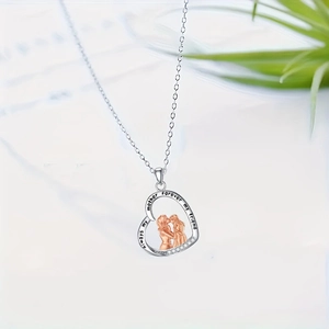 Silver heart necklace with gold mother daughter pendant and sparkling zircon stones