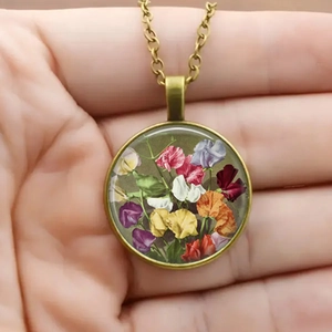 Collier vintage en bronze avec pendentif cabochon en verre fleur de vie coloré