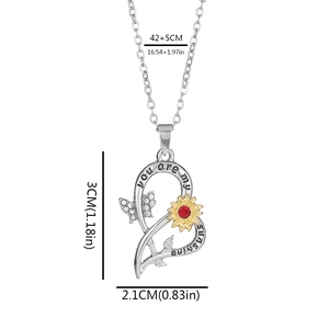 Two-tone heart necklace with sunflower, crystal butterfly, and engraved 'You are my sunshine'
