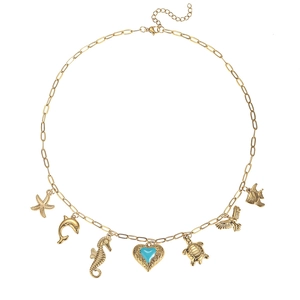 Collana oceanica dorata con ciondoli a stella marina tartaruga e pendente cuore blu
