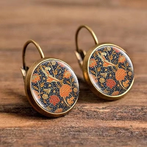 Detail of vintage pink rose floral pattern earrings with French lever-back hooks