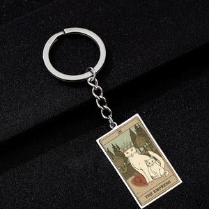 Detail showing The Empress tarot cat design on polished stainless steel keychain
