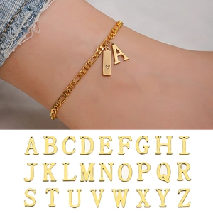 Cavigliera Figaro in acciaio dorato con ciondolo a lettera A e charm a forma di cuore