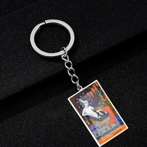 Gothic The Empress tarot card keychain with colorful painting on black background