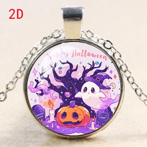 Macro shot of Halloween necklace detail with pumpkin and ghost illustration on round pendant