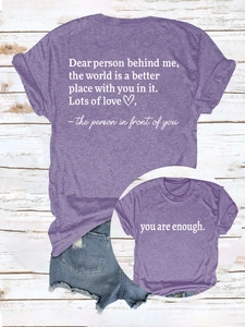 Detail of purple cotton T-shirt featuring You are enough front print and back quotes