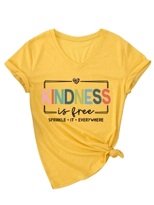 Detail of V-neck mustard yellow t-shirt with kindness leopard print and front knot tie
