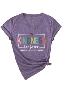 Detail of purple V-neck tee with Kindness is free print and leopard heart side knot