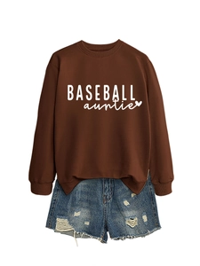 Detailed close-up of brown crewneck sweatshirt featuring white Baseball Auntie heart print