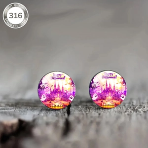 Close-up of Halloween round stud earrings with ghost and pumpkin icons on wood