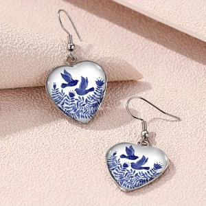 Blue bird and floral pattern heart earrings in stainless steel with porcelain style print