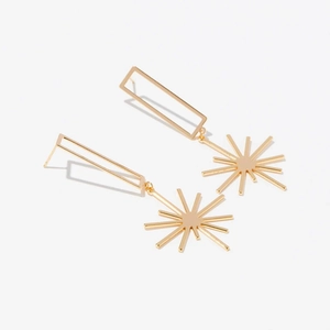 Golden geometric earrings with starburst pendant and rectangular studs on white background