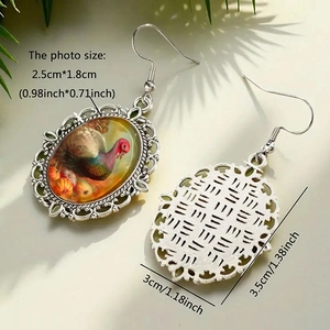 Silver lace turkey pumpkin earrings with fall holiday theme and scalloped metal edges