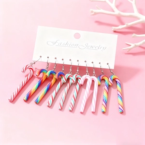 Detailed set of five candy cane drop earrings in various colorful striped resin patterns