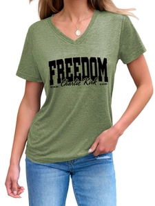 Close-up of V-neck cotton T-shirt featuring FREEDOM and Charlie Kirk signature print