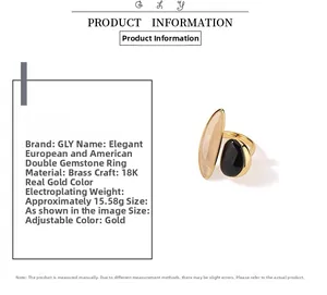 Detailed view of an 18K gold plated brass ring with black onyx and natural quartz stones