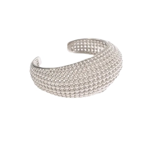 Wide hollow cuff bracelet with textured silver beads and minimalist open design