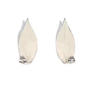 Minimalist leaf-shaped cream enamel earrings with silver finish and curved botanical design