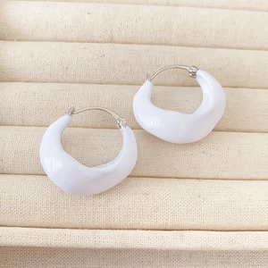 Chic irregular white enamel hoop earrings with gold plated base in a luxury jewelry box
