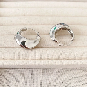 Polished silver-tone chunky teardrop earrings with elegant organic curved design