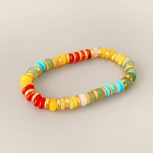 Colorful beaded elastic bracelet with gold spacers and sparkling rhinestone accents