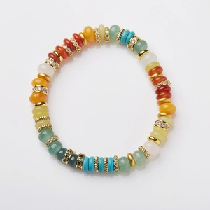 Colorful natural stone beaded bracelet with gold spacers and sparkling zircon accents