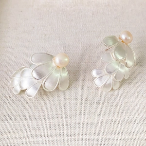 Three-layer petal silver brushed studs with freshwater pearls and elegant floral design