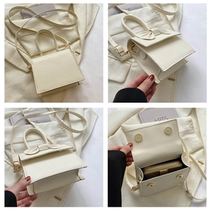 Dettaglio della mini borsa a tracolla bianco crema con fiocco e chiusura magnetica