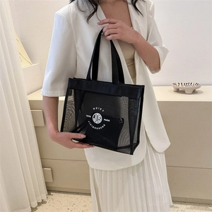 Large capacity black mesh tote bag with inner pouch for beach or travel use