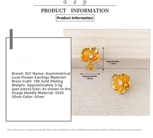 Detail of asymmetrical gold-plated flower stud earrings with sparkling center zirconia