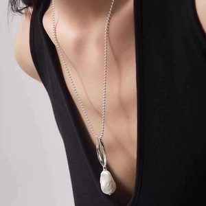 Minimalist long silver chain necklace with a large natural baroque pearl pendant for women