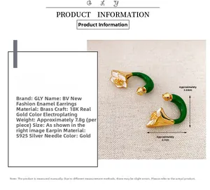 Detailed view of enamel camellia earrings with 18k gold plating and S925 silver needles