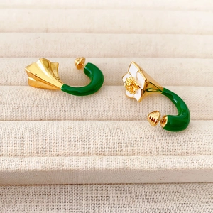 Elegant 3D camellia enamel earrings in gold and green metal with a C-shaped floral design