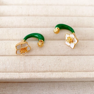 Vintage 3D camellia enamel earrings with white petals and green U-shaped ear hooks