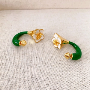Chic 3D camellia enamel C-shaped earrings with white flower petals and golden accents